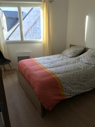 Ένα ή περισσότερα κρεβάτια σε δωμάτιο στο Appartement numéro 4 ou numéro 8