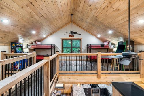 an overhead view of a log cabin with a vaulted ceiling at New Luxury Vacation Home Cabin in Smoky Gatlinburg - Theater Room in Gatlinburg