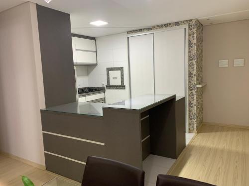 Η κουζίνα ή μικρή κουζίνα στο Apartamento do Aconchego