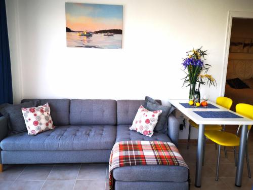 Posezení v ubytování Sunny apartment with 2 terraces