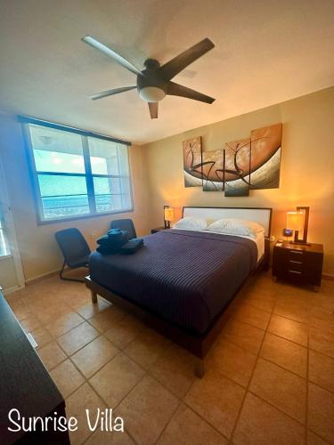 Llit o llits en una habitació de Sunrise Villa