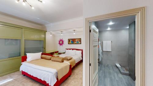 Ένα ή περισσότερα κρεβάτια σε δωμάτιο στο Aspar Boutique Hotel