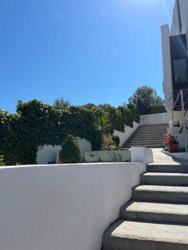 a set of stairs leading up to a building at Villa en Oropesa in Oropesa del Mar