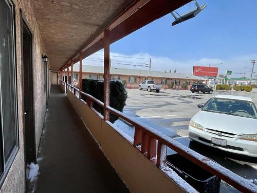 a car parked on the side of a building at Desert Inn in Mojave
