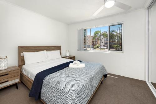 Ένα ή περισσότερα κρεβάτια σε δωμάτιο στο Joanne Apartments