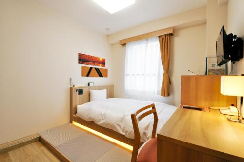 TV a/nebo společenská místnost v ubytování Annex Hotel Abe