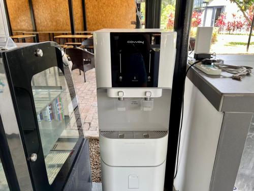 a coffee machine sitting on top of a counter at PLAY at Lot 31 Eco Orchard Melaka in Sempang Sentul