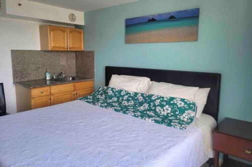 Katil atau katil-katil dalam bilik di Waikiki Condo High Floor Views Beaches Convention Center
