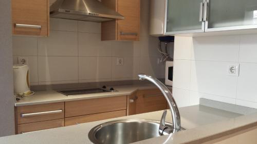 Kuchyň nebo kuchyňský kout v ubytování AApartments in city center