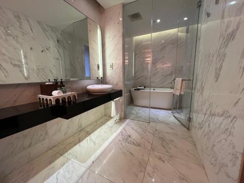 Koupelna v ubytování Naumi Hotel Singapore