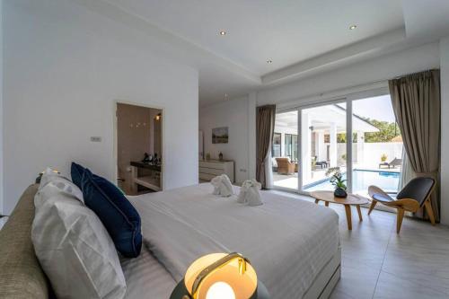 Voodi või voodid majutusasutuse Modern Large 2 Bedroom Pool Villa PV2 toas