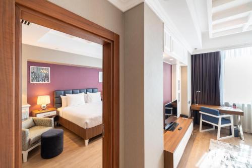 Katil atau katil-katil dalam bilik di Questa Thermal & Spa Hotel