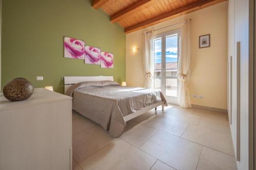 Ліжко або ліжка в номері Villa Tonnara Vista Mare - SiciliaVacanza