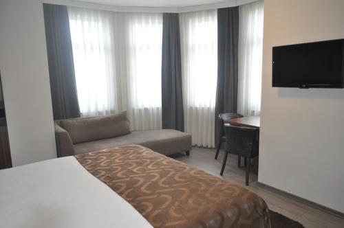 Katil atau katil-katil dalam bilik di Hotel Atabay