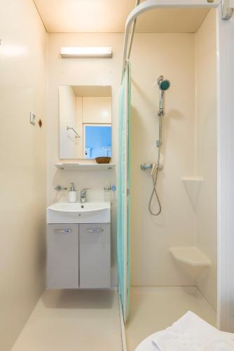 a bathroom with a shower and a sink at Holiday AD Duomo, Florence in Florence