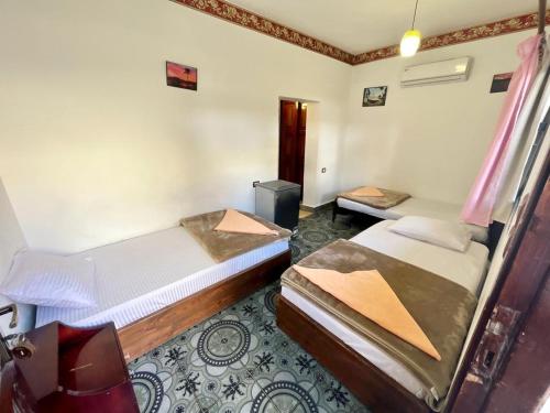 Cama o camas de una habitación en Oasis Fighting Kangaroo