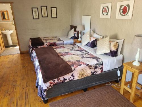 מיטה או מיטות בחדר ב-Baroe House