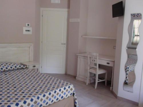 Katil atau katil-katil dalam bilik di B&B Lo Scoiattolo del Pollino