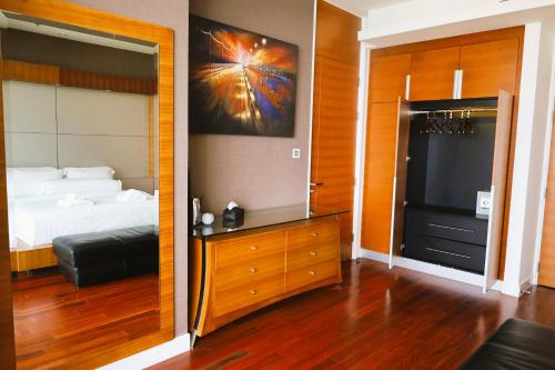 Ένα ή περισσότερα κρεβάτια σε δωμάτιο στο Premium Oceanview Condominium