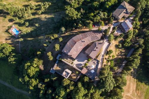 an overhead view of a house with a roof at Castello Di Petroia Dimora d'Epoca in Gubbio