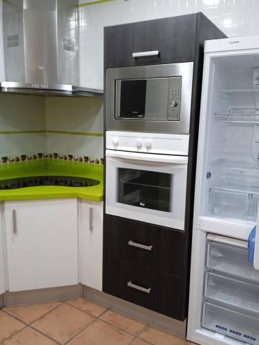 Kuchyň nebo kuchyňský kout v ubytování Casa Los Trillizos