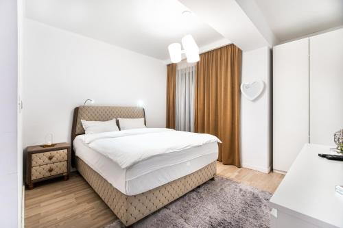 מיטה או מיטות בחדר ב-Il Magnifico
