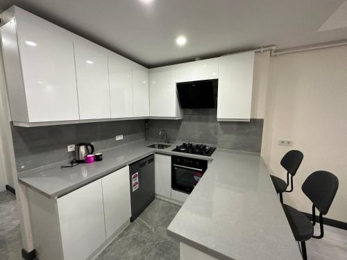 Η κουζίνα ή μικρή κουζίνα στο Rose Plus Residence