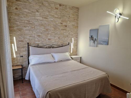 Katil atau katil-katil dalam bilik di Masseria Casale Dei Fornici