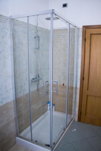 a shower with a glass enclosure in a bathroom at Antica Cittadella B&B in Arezzo
