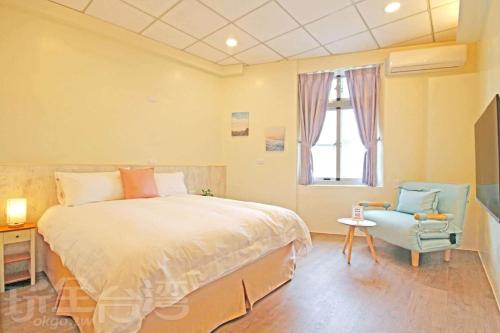 Giường trong phòng chung tại Lu Dao Homestay