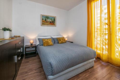 Postel nebo postele na pokoji v ubytování Apartman Neda