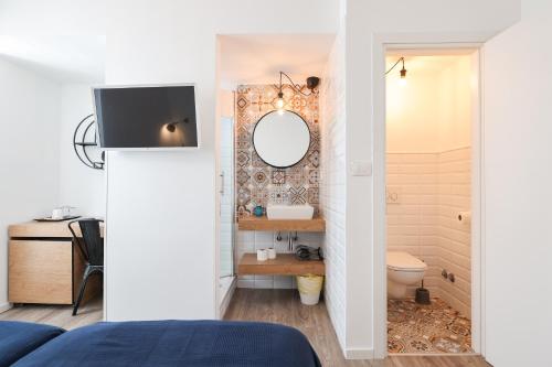 Ένα μπάνιο στο Zaratino rooms
