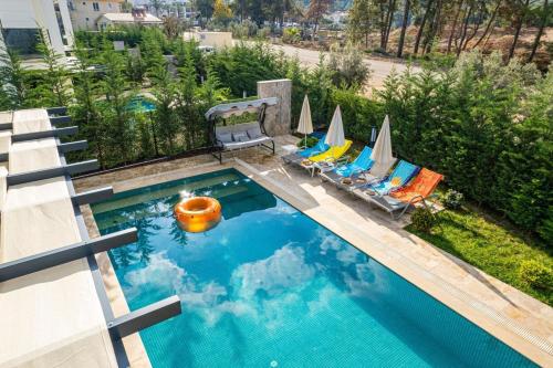 Výhled na bazén z ubytování Villa Gold Rose, Zentrumsnahe Villa für 8 Personen in Oludeniz Hisaronu nebo okolí