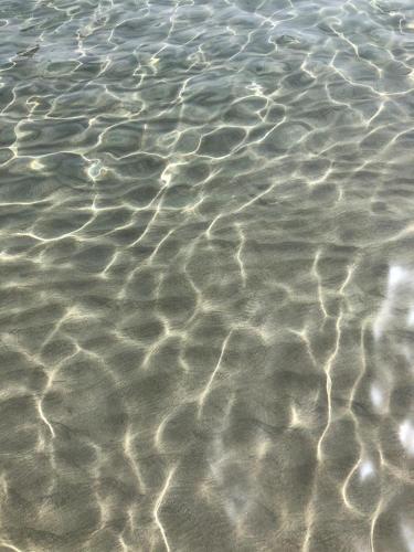 a close up of water with ripples in it at Perla D'Oriente - Affittacamere in Otranto