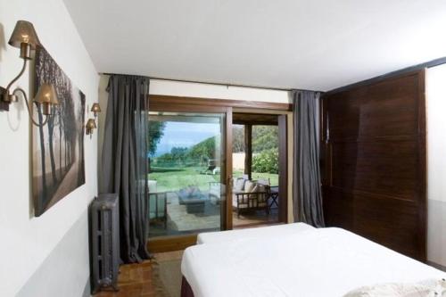 Postel nebo postele na pokoji v ubytování La casa nella Macchia