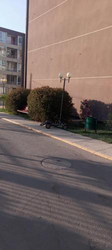 a scooter parked on the side of a street at Esperanza in Los Andes