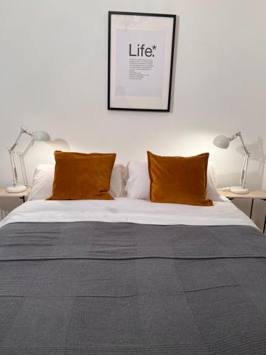 Ένα ή περισσότερα κρεβάτια σε δωμάτιο στο Urban rooms Fuencarral