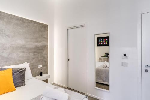 Ένα ή περισσότερα κρεβάτια σε δωμάτιο στο Gallery Suite Naples