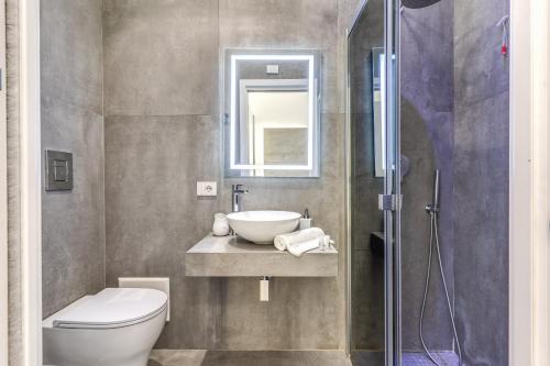 Ένα μπάνιο στο Gallery Suite Naples