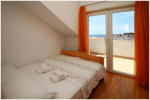 Postel nebo postele na pokoji v ubytování Guest House Lav
