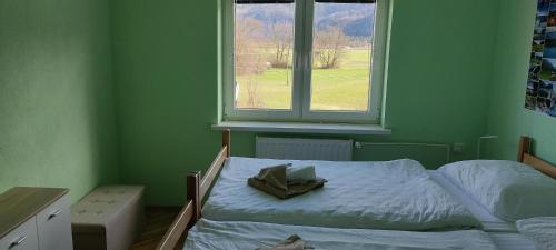 Postel nebo postele na pokoji v ubytování Hacienda Bled Rooms