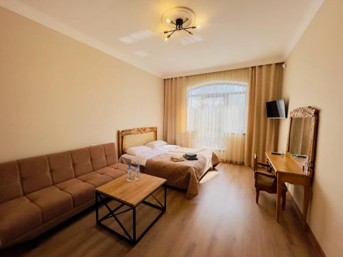 Postel nebo postele na pokoji v ubytování General guesthouse