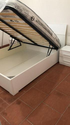 Postel nebo postele na pokoji v ubytování Fausthome Sant'Antioco