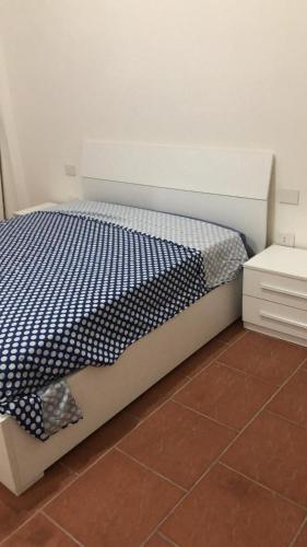 Postel nebo postele na pokoji v ubytování Fausthome Sant'Antioco