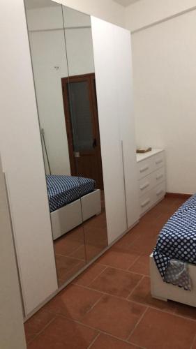 Postel nebo postele na pokoji v ubytování Fausthome Sant'Antioco