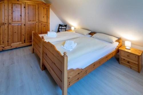 Postel nebo postele na pokoji v ubytování Ferienhaus-Lucy