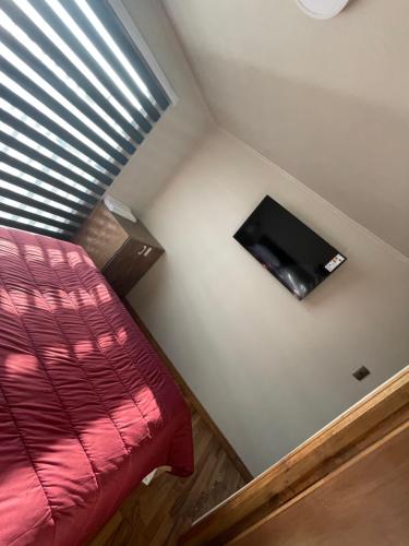 Sjónvarps- og/eða afþreyingartæki á Hostal LG Laraquete