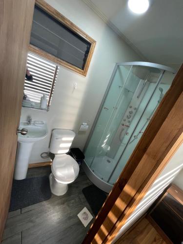 Baðherbergi á Hostal LG Laraquete