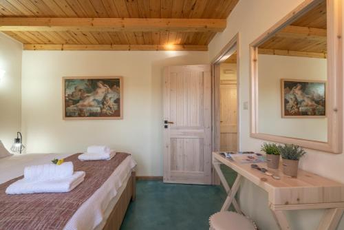 Postel nebo postele na pokoji v ubytování Avocado Villas