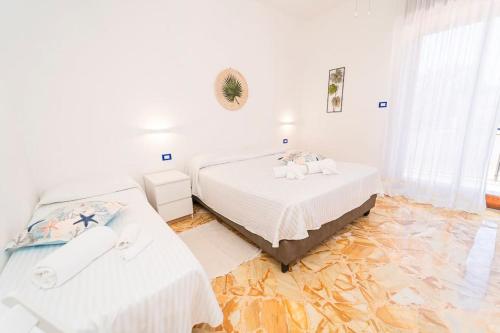 Postel nebo postele na pokoji v ubytování Vietri - Apartment in the center of Maiori